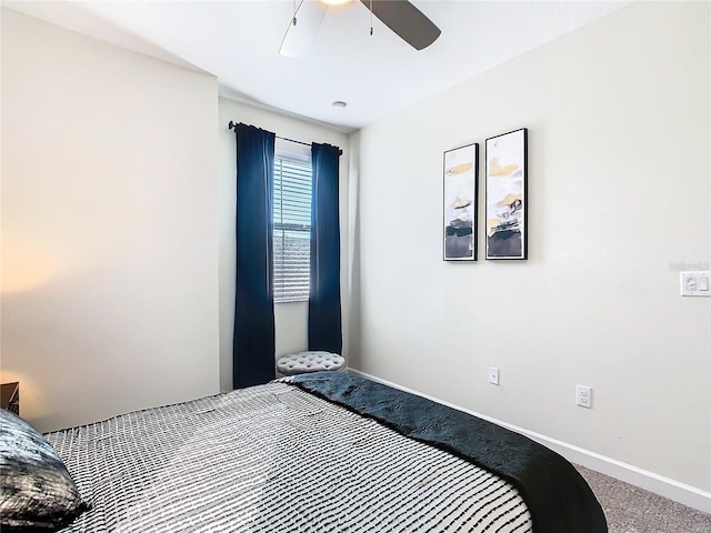 bedroom featuring ceiling fan and carpet floors