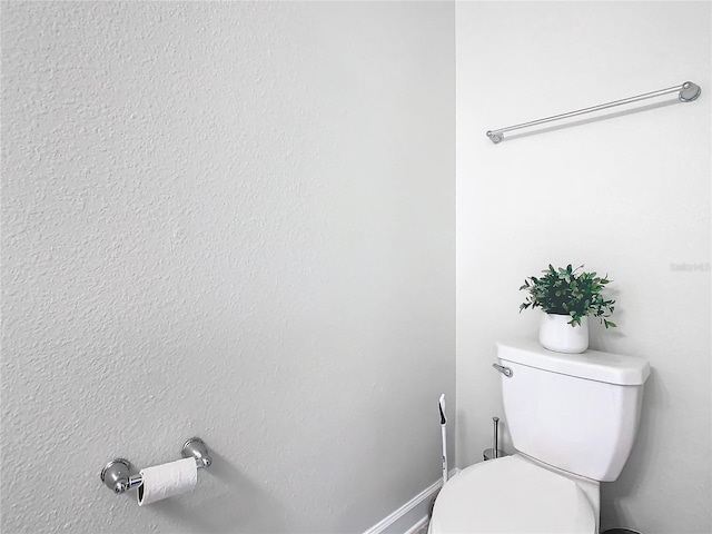 bathroom featuring toilet