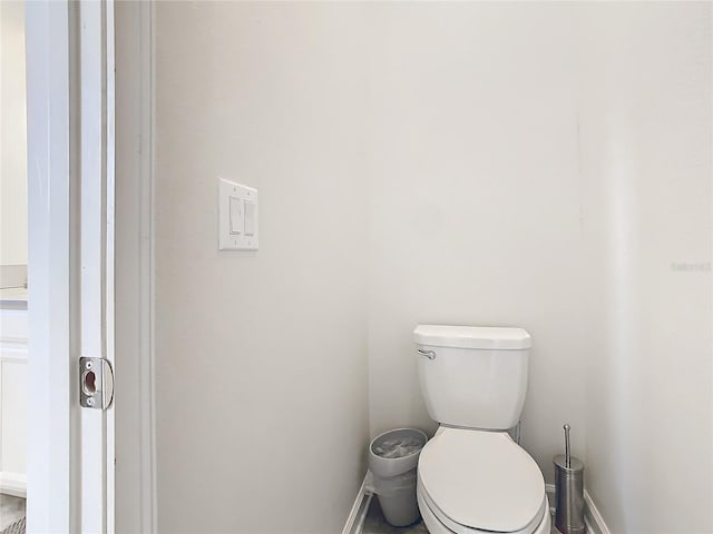 bathroom featuring toilet