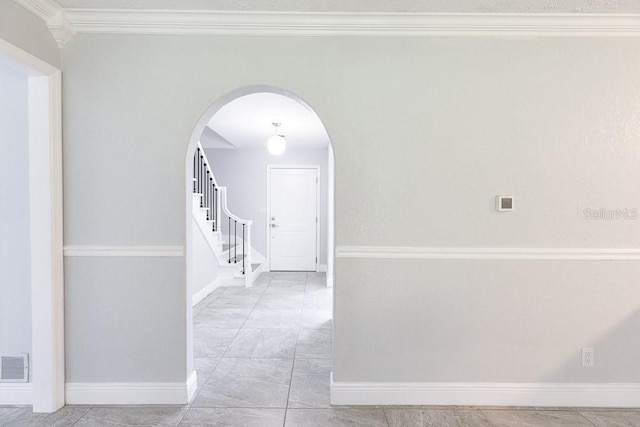 hallway with crown molding