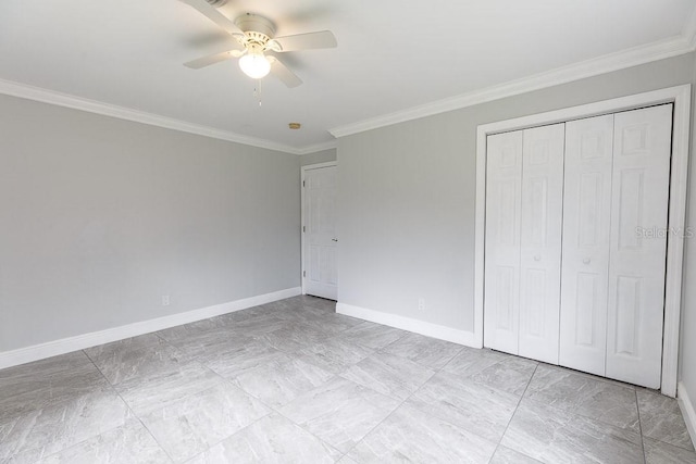 unfurnished bedroom featuring ceiling fan, a closet, and ornamental molding