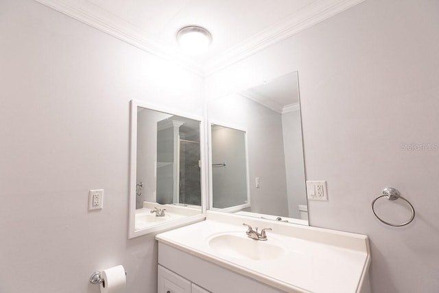 bathroom featuring vanity and ornamental molding