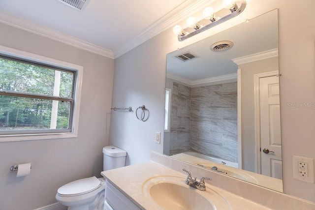 bathroom with vanity, toilet, and ornamental molding