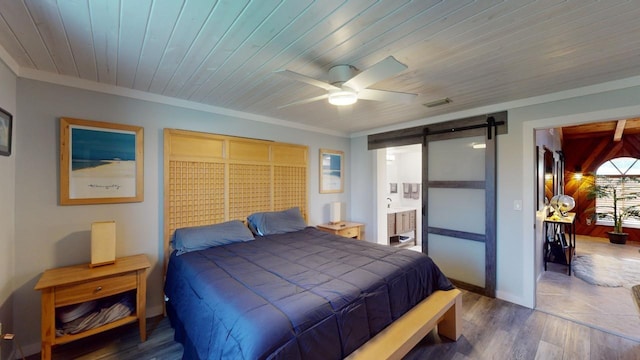 bedroom with dark hardwood / wood-style flooring, wood ceiling, ceiling fan, crown molding, and a barn door