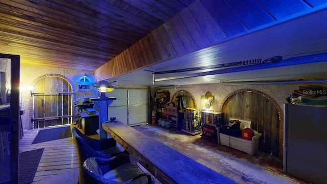 garage featuring wooden ceiling