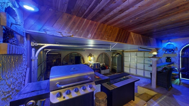 garage featuring wooden ceiling