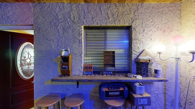 bar with wooden ceiling