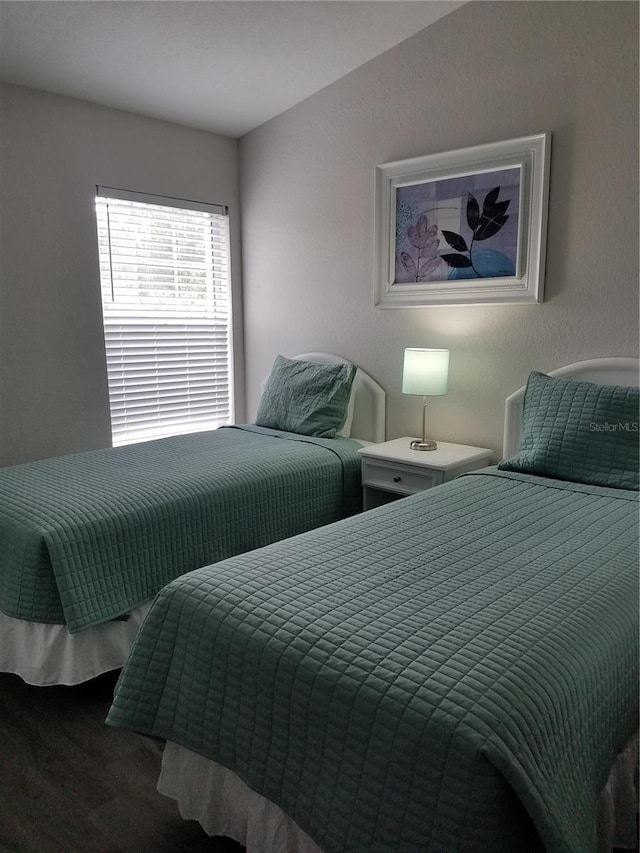 bedroom featuring wood-type flooring