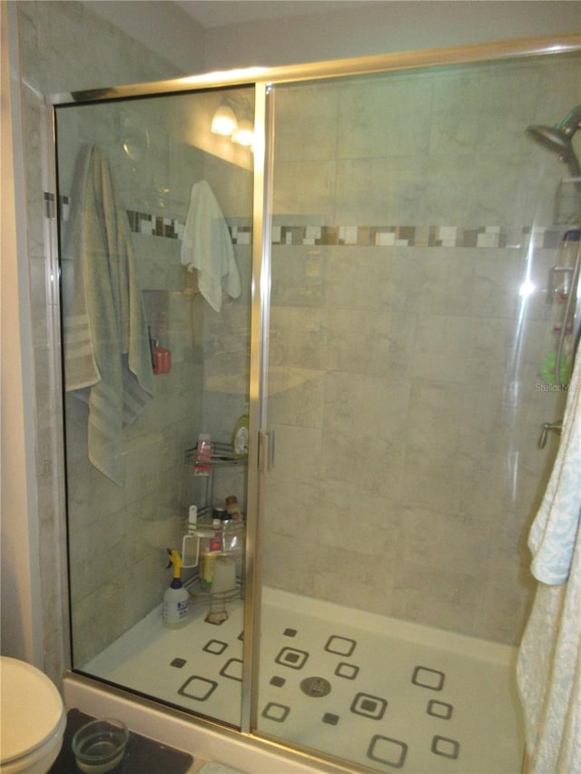 bathroom with an enclosed shower