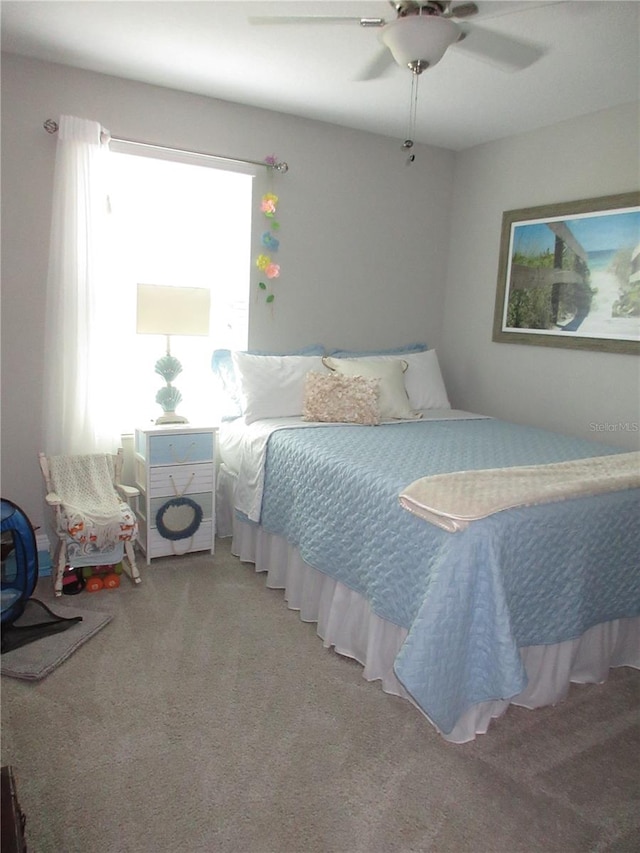 bedroom featuring carpet floors and ceiling fan