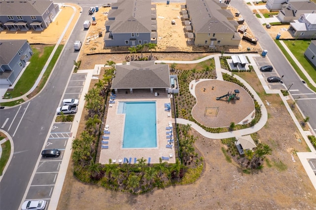 birds eye view of property with a residential view