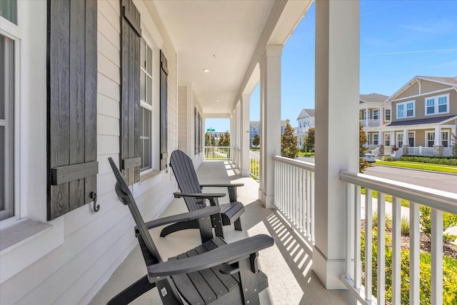 balcony featuring covered porch