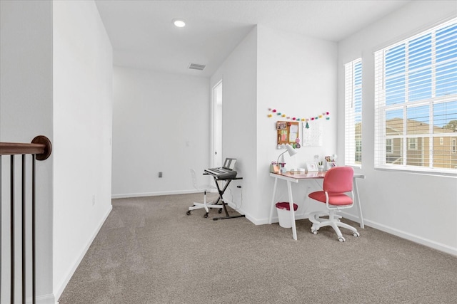 carpeted office featuring plenty of natural light