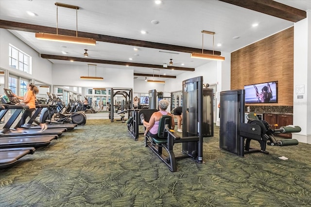 workout area featuring carpet and ceiling fan