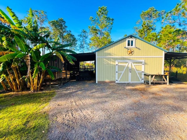 view of outdoor structure featuring a carport