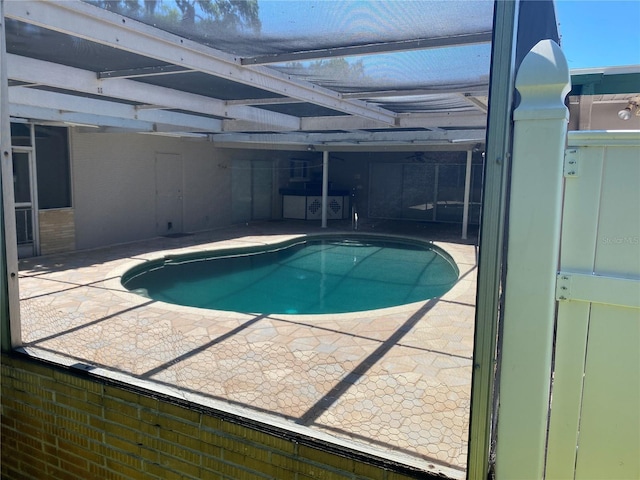 view of swimming pool featuring a patio area