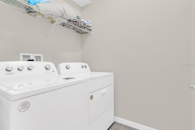 laundry room featuring washing machine and dryer and hookup for a washing machine