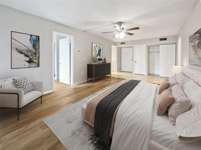 bedroom featuring ceiling fan and light hardwood / wood-style flooring