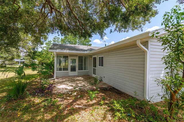 back of property with a patio area