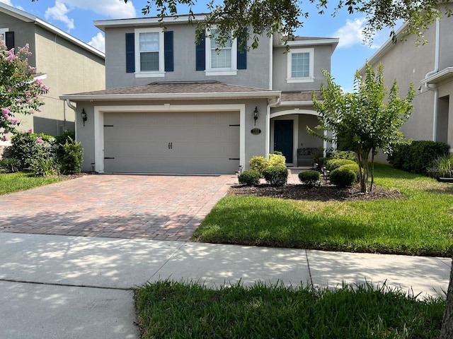 view of front of home with a garage