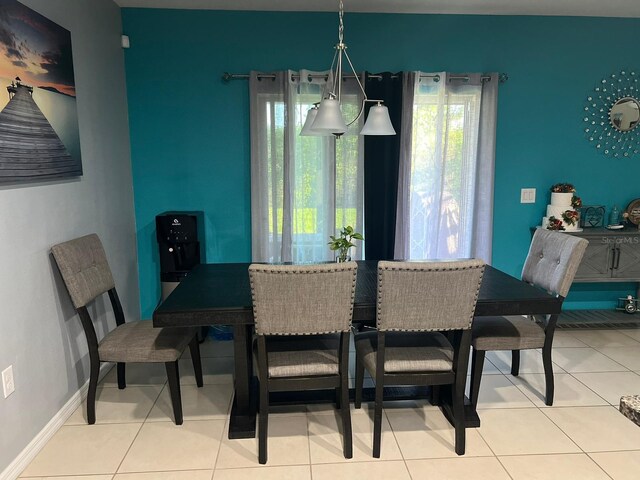 dining room with light tile flooring