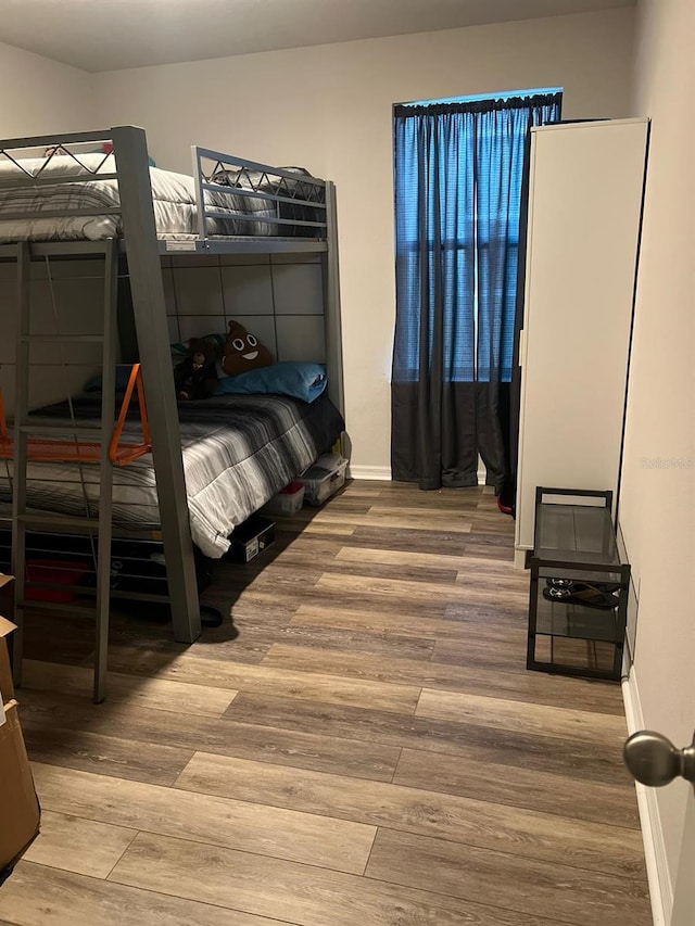 bedroom featuring hardwood / wood-style floors