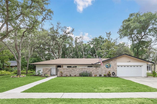 single story home featuring a front lawn and a garage