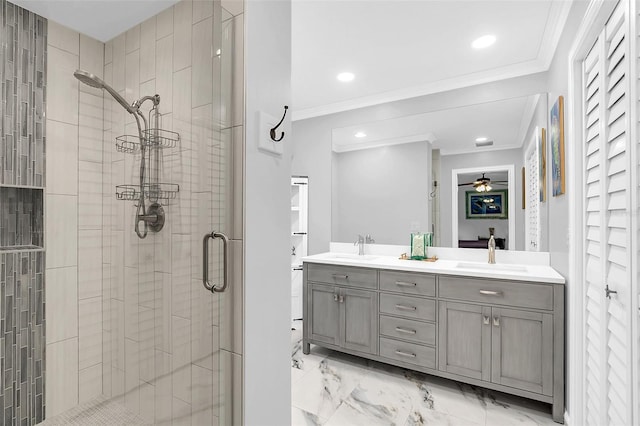 bathroom featuring ceiling fan, crown molding, double sink, tile floors, and large vanity