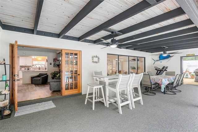 interior space with ceiling fan