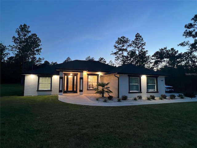 view of front of property with a front yard