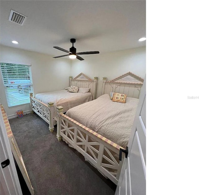 carpeted bedroom with visible vents, recessed lighting, baseboards, and a ceiling fan