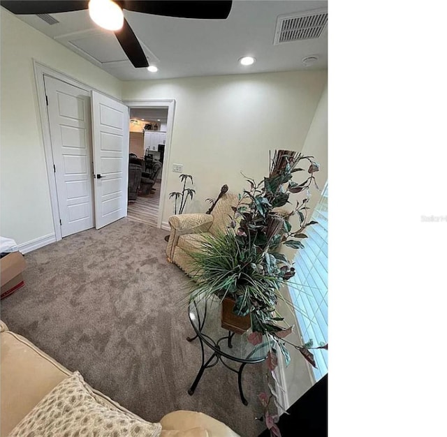 living room with a ceiling fan, carpet, visible vents, baseboards, and recessed lighting