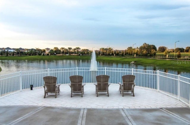 view of patio / terrace with a water view