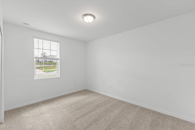 empty room with carpet floors