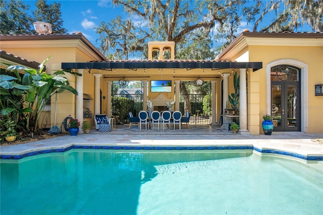 exterior space with french doors and a patio