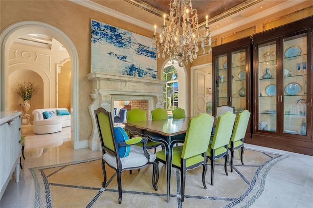 tiled dining room featuring ornamental molding