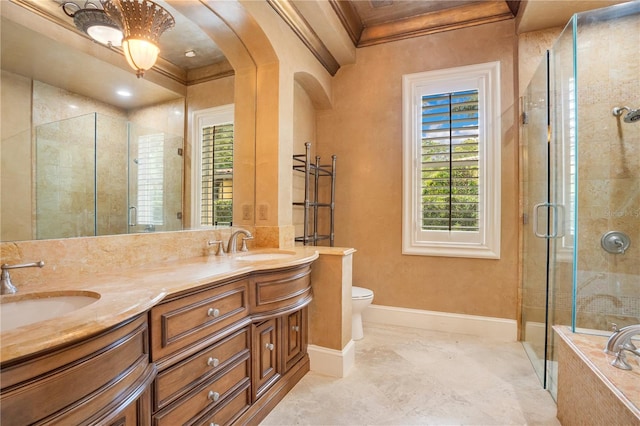 bathroom featuring vanity, toilet, crown molding, and an enclosed shower