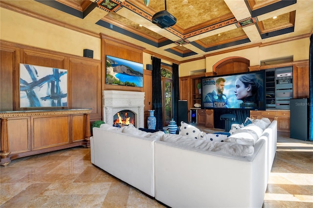 living room featuring beam ceiling, ornamental molding, coffered ceiling, and a towering ceiling