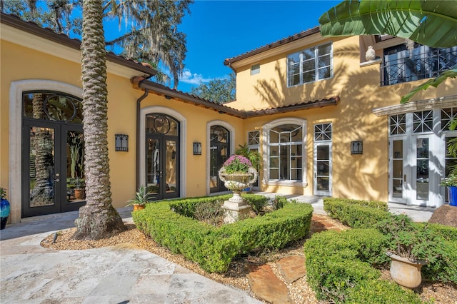 property entrance with french doors