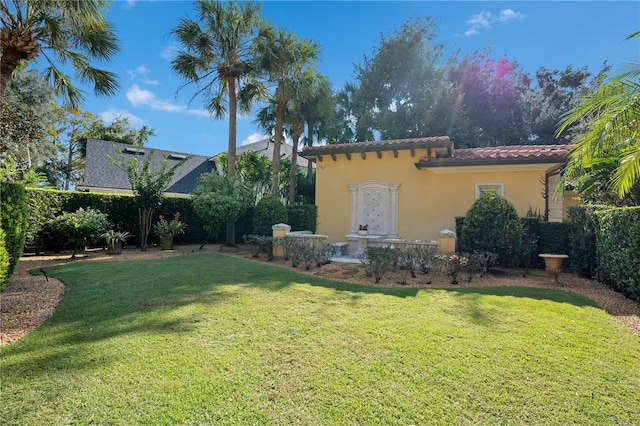 exterior space with a lawn