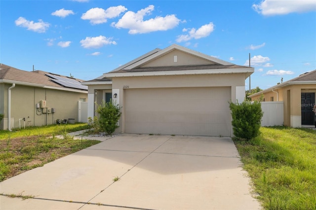 ranch-style house featuring a garage