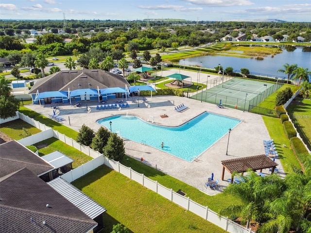 view of swimming pool featuring a water view