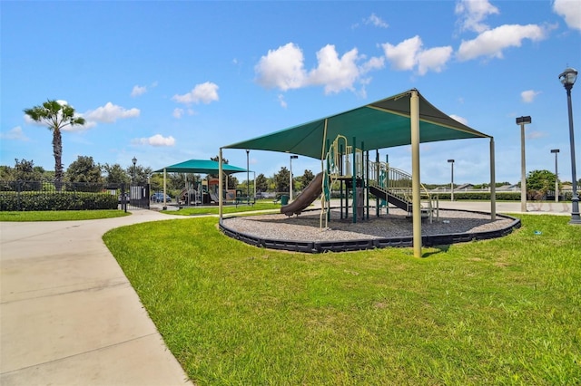 view of jungle gym featuring a yard