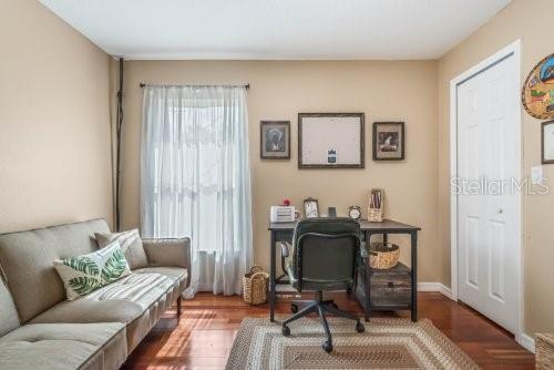 office featuring wood finished floors and baseboards