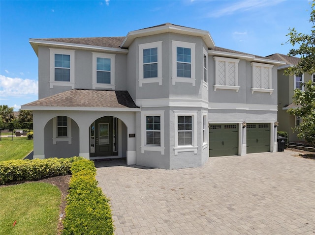 view of front of home with a garage