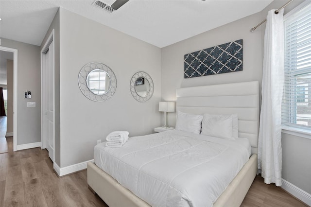 bedroom featuring light hardwood / wood-style floors