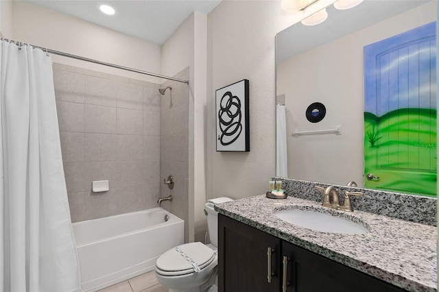 full bathroom with toilet, shower / tub combo, vanity, and tile patterned floors