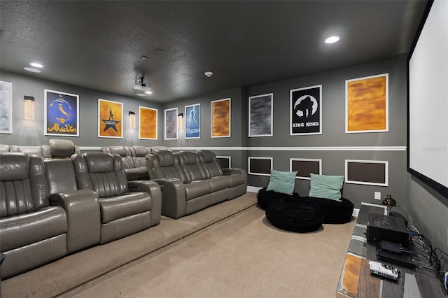 cinema with carpet flooring and a textured ceiling