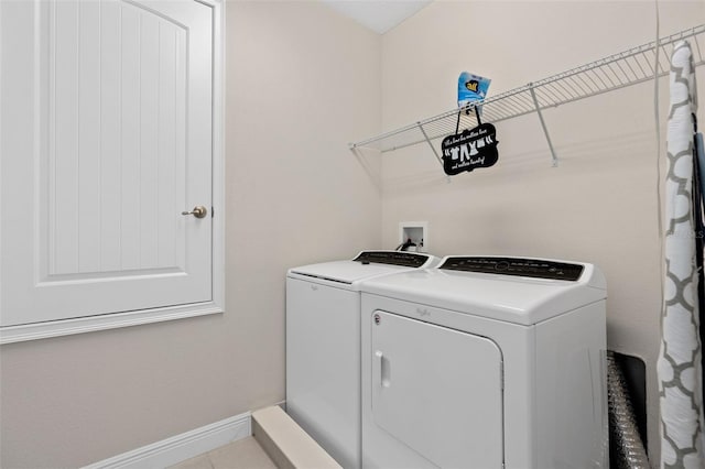 laundry room featuring washing machine and dryer