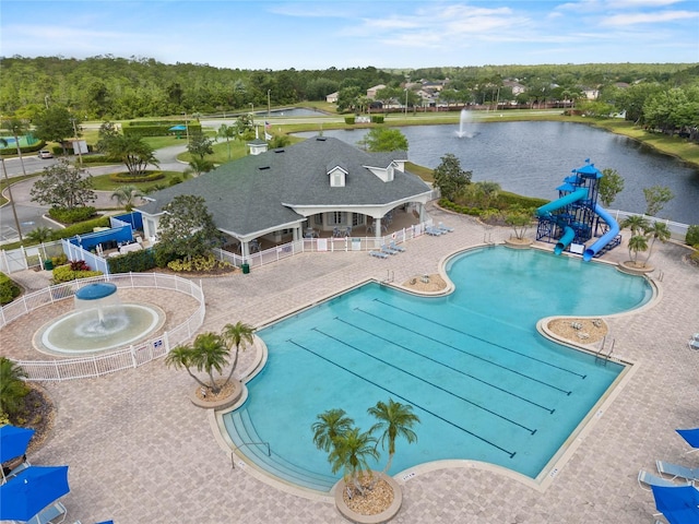 view of pool with a water view, pool water feature, and a water slide